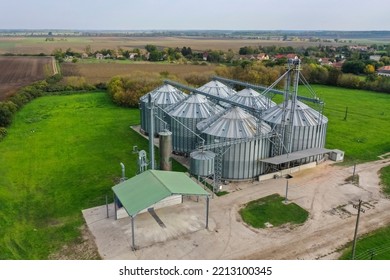 Agricultural Silos On The Farm In Autumn, Close-up Drone View. Industrial Granary, Elevator Dryer, Building Exterior, Storage And Drying Of Grain, Wheat, Corn, Soy, Sunflower. Europe In Hungary