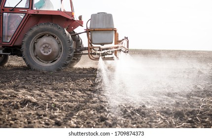 Agricultural Sprayers, Spray Chemicals On Field. Spraying Pesticides On Field With Sprayer