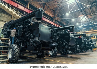 Agricultural Tractors Or Combine Harvesters In Industrial Machinery Factory Big Hangar Or Warehouse Garage