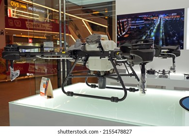 Agriculture Drone Dji At DJI Store. Drone For Agriculture Flying And Spraying Fertilizer And Pesticide Over Farmland. High Technology Innovations And Smart Farming. Minsk, Belarus - April, 2022