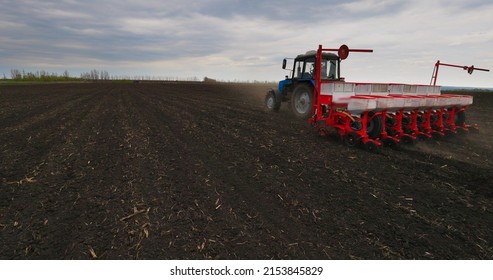 Agriculture Farm Tractor Seeding Machine Field Seeder Village Planter Rural Working Combine Tillage Plowing Agricultural Equipment Season Sowing Grain Spring Time Process Planting Seeds 