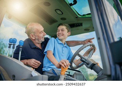 Agriculture, father and son on tractor for teaching, love and bonding together with happiness. Family, dad and boy on farming vehicle for drive, learning and child development with smile on break - Powered by Shutterstock