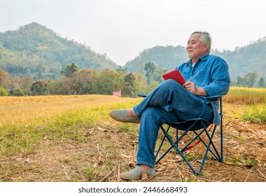 Agriculture industry and technology concept. Asian senior man farmer working in digital tablet inspect organic wheat rice paddy field farmland. Elderly male farm owner preparing to harvest crop plant. - Powered by Shutterstock