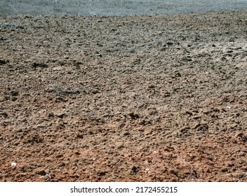 Agriculture and soil science. Autumn harrowed field at springtime, chestnut soil, humus-accumulated 2% horizon  - Shutterstock ID 2172455215