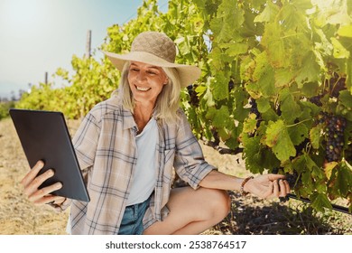 Agriculture, tablet and quality check with woman in vineyard for winery, grape farming or countryside. Sustainability, inspection and environment with mature person in nature for research and harvest - Powered by Shutterstock