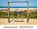 Aguas Belas beach in Cascavel in Ceará Brazil, dunes, viewpoint, swing for photos, river and lagoon