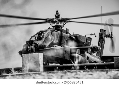 Los pilotos AH-64 asignados al 1er Batallón de Ataque, 82a Brigada de Aviación de Combate, 82a División Aerotransportada alimentan sus aviones el 25 de abril de 2024.