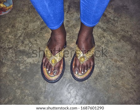 Ahenema traditional sandals on woman foots