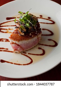 Ahi Tuna. Fish Sautéed In Olive Oil, Butter, Garlic And Garnished With Scallions, Parsley And Served With Lemons. Classic Italian Or American Restaurant Or French Bistro Entree.