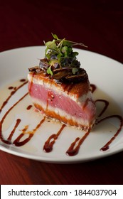 Ahi Tuna. Fish Sautéed In Olive Oil, Butter, Garlic And Garnished With Scallions, Parsley And Served With Lemons. Classic Italian Or American Restaurant Or French Bistro Entree.