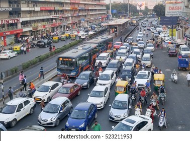 Ahmedabad, India - November 26, 2016: Light Volume Traffic Scene In Ahmedabad. Auto Rickshaws And Bus Rapid Transport (BRT) Buses Provide Public Transportation.