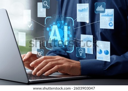 AI analyzing and summarizing data reports or papers. Artificial intelligence generating document. Businessman typing on laptop computer keyboard at desk in office.