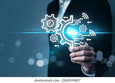 AI (Artificial intelligence) concept, ai machine learning, person hold light bulb with ai and gears cogs icons, deep learning, automation, problem solving, cloud computing, quantum computing, IOT.