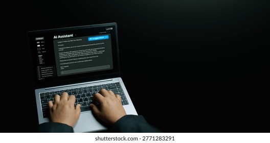 AI assistant concept. Hands using a laptop with an AI suggesting and generating an email reply. Generative artificial intelligence for productivity, large language models, smart personal assistance.