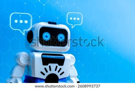 AI bot, Artificial intelligence assistant technology concept. White smart cute robot with conversation speech bubble on blue network background with copy space, online communication chatbot service.