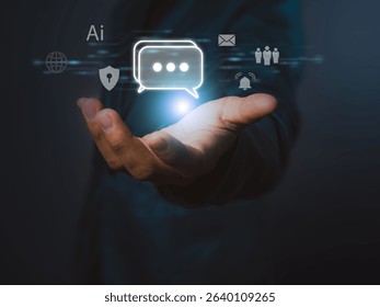 An ai chat message icon glowing above open hand with digital communication and security symbols in dark background, representing technology and connection