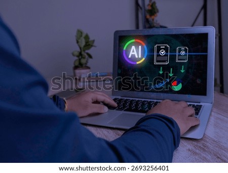AI data extractor. Man using laptop with AI software automating information retrieval, processing unstructured documents, and analyzing data.
