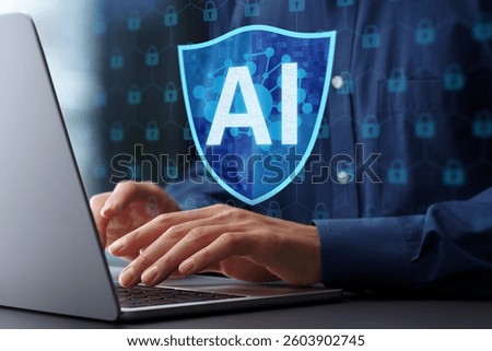 AI driven automated security response and threat detection. Artificial intelligence powered firewall and network defense. Man using laptop computer with machine learning based network security system.