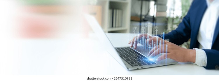 AI Driven Customer  Analytics Concept. Hands typing on a laptop with a digital overlay of interconnected data analysis and artificial intelligence icons, representing an AI powered customer insights.