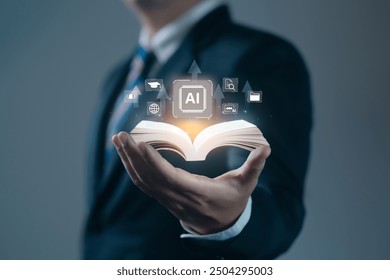 AI Education Book on hand of businessman with icon AI Education - Powered by Shutterstock