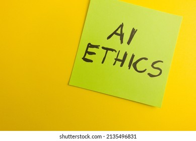 AI Ethics Text Handwritten On Sticky Note. Artificial Intelligence Concept