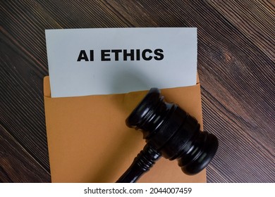 Ai Ethics Text On Document Above Brown Envelope.