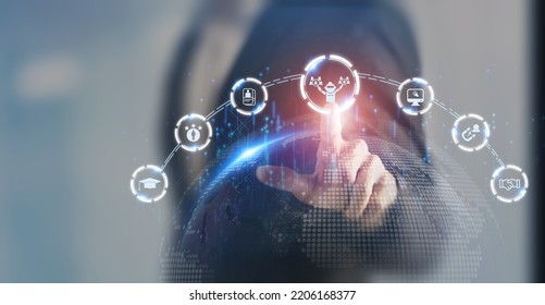 AI recruiting technology concept. Using artificial intelligence in the talent acquisition process. A robot choosing business people to hire. HR technology ecosystem strategies for HR professionals. - Shutterstock ID 2206168377