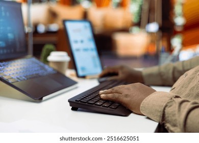 AI software developer creating an algorithm for deep learning and data mining, coding on his laptop at home office. Expert processing binary code on supercomputer neural network. Close up.