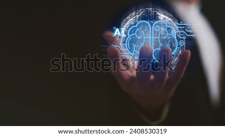 Ai technology concept, Artificial Intelligence, Digital technology, A Businessman holding digital brain in virtual global hologram on his hand to command.