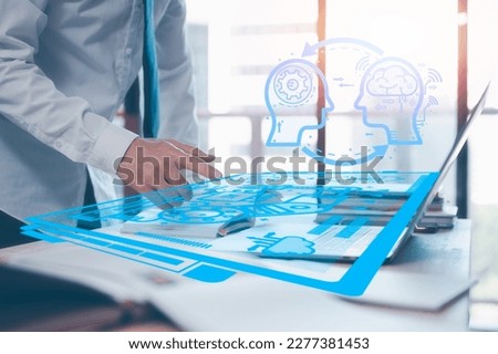 AI technology concept, man using AI tech to working business project, businessman working on computer laptop and books to analyst and develop business growth