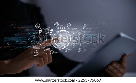 AI technology on mobile devices with various features. Female hand touching AI brain icon on virtual screen via tablet screen.