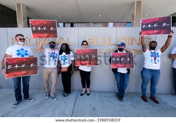 AIDS Healthcare Foundation advocates and their\
supporters take part in a demonstration to demand for the U.S. to\
make COVID-19 vaccines accessible across the globe, in Los Angeles,\
June 10, 2021. 
