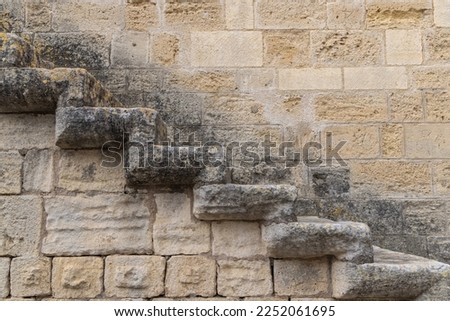 Aigues-Mortes, Gard, Occitania, France. Stone steps on the old city wall of Aigues-Mortes.