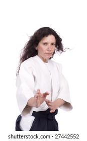 Aikido teacher posing isolated over white background