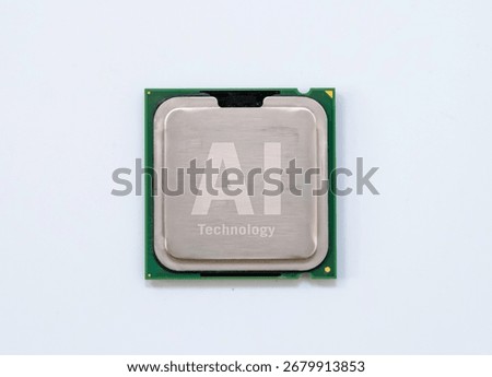 AI-labeled processor chip isolated on white background, showing front side and metallic surface, symbolizing modern artificial intelligence.