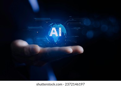 AI,Machine learning data analysis and data management, Businessman holding AI icon global networks. Data analysis using artificial intelligence is essential. Cyber security using AI is essential.