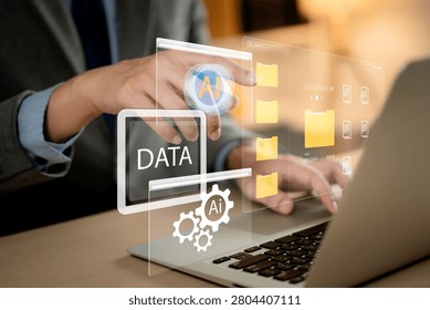 AI-powered data management and digital organization concept. professional using artificial intelligence to store, organize and automate files on a laptop. AI, data, automation, storage, management	