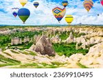 Air balloons in Unique natural place in Cappadocia - Valley of Love, Turkiye.