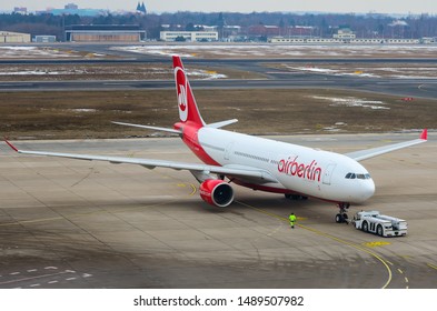 Air Berlin Airbus A330-223, Registration D-ALPB, Manufacturer Serial Number (MSN): 432, Is Being Pushed Back From The Gate By A Tug At The Berlin Tegel Airport. Berlin, Germany March 30, 2013.