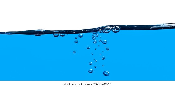 Air Bubbles Both Above And Below The Blue Water Surface. White Copy Space.