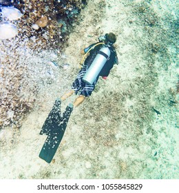 Air Bubbles Emerging From Diver At Beautiful Coral Reef Under Water