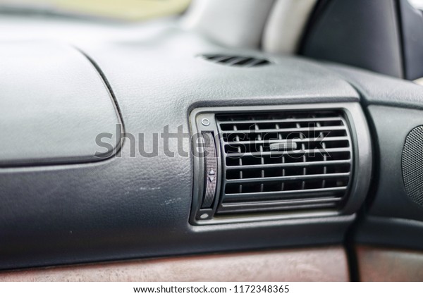 Air car conditioner. Air conditioner in modern car\
interior detail
