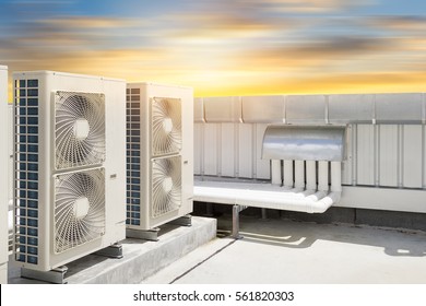 Air Compressor Or Air Condenser Unit Located On Roof Deck Building To Heat Released Transferred To Surrounding Environment, Compressor Is Part Of Cooling Function And Air Conditioning HVAC Systems.