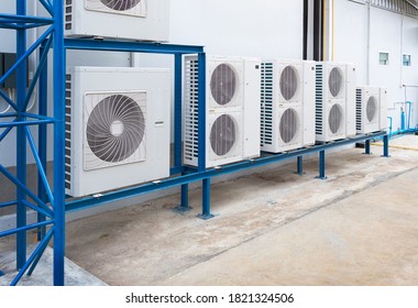 Air compressor or condenser unit outside building. That is part of mini split system or ductless system type. For removing heat and moisture from indoor or room. Also temperature and humidity control.
