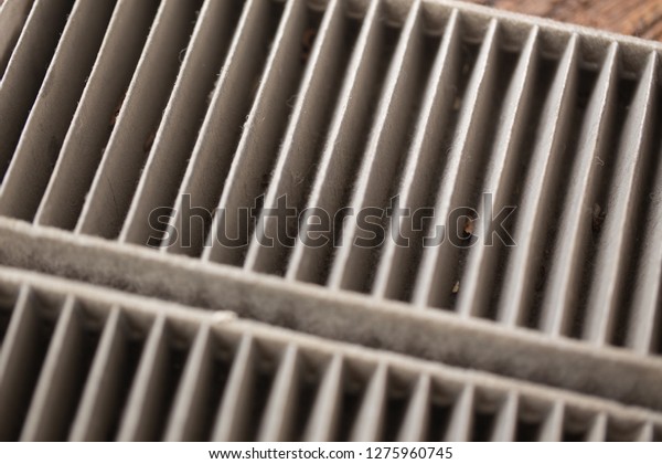 Air con\
filter of car is dirty must change\
closeup