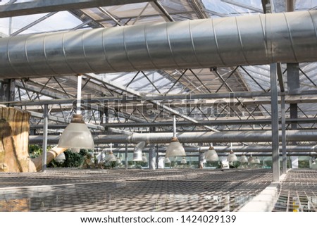 Air Condition pipe line system with glass ceiling. Ceiling air duct and light