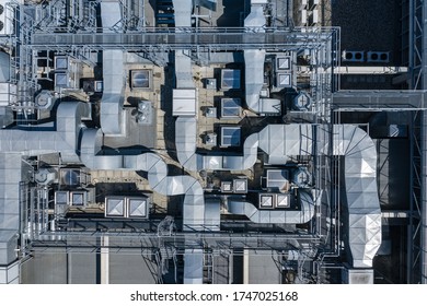 Air Condition Ventilation System on the Building Roof. Industrial Air system of ventilation and Air conditioning. Aerial Shot.