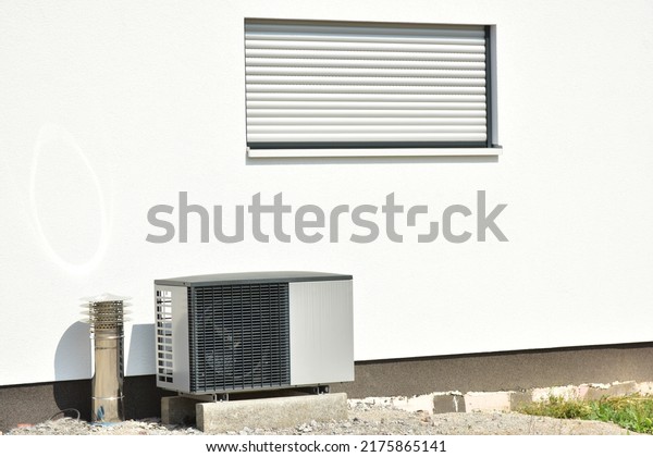 Air conditioner, Air-Air Heat
Pump for Heating and hot Water in Front of an Residential
Building