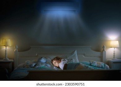 Air conditioner in bedroom. Kids room climate control. Mother and child in bed under cool air breeze. Comfortable temperature for healthy sleep on summer night. Air conditioning device in family home. - Powered by Shutterstock