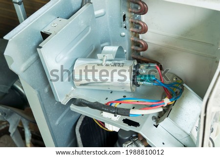 Air conditioner capacitor, Checking air compressor capacitor, Home appliances repair service.